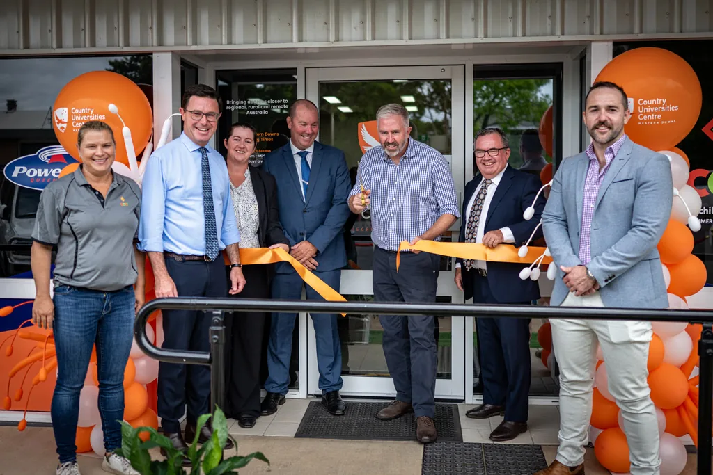 A ribbon cutting at a local business opening