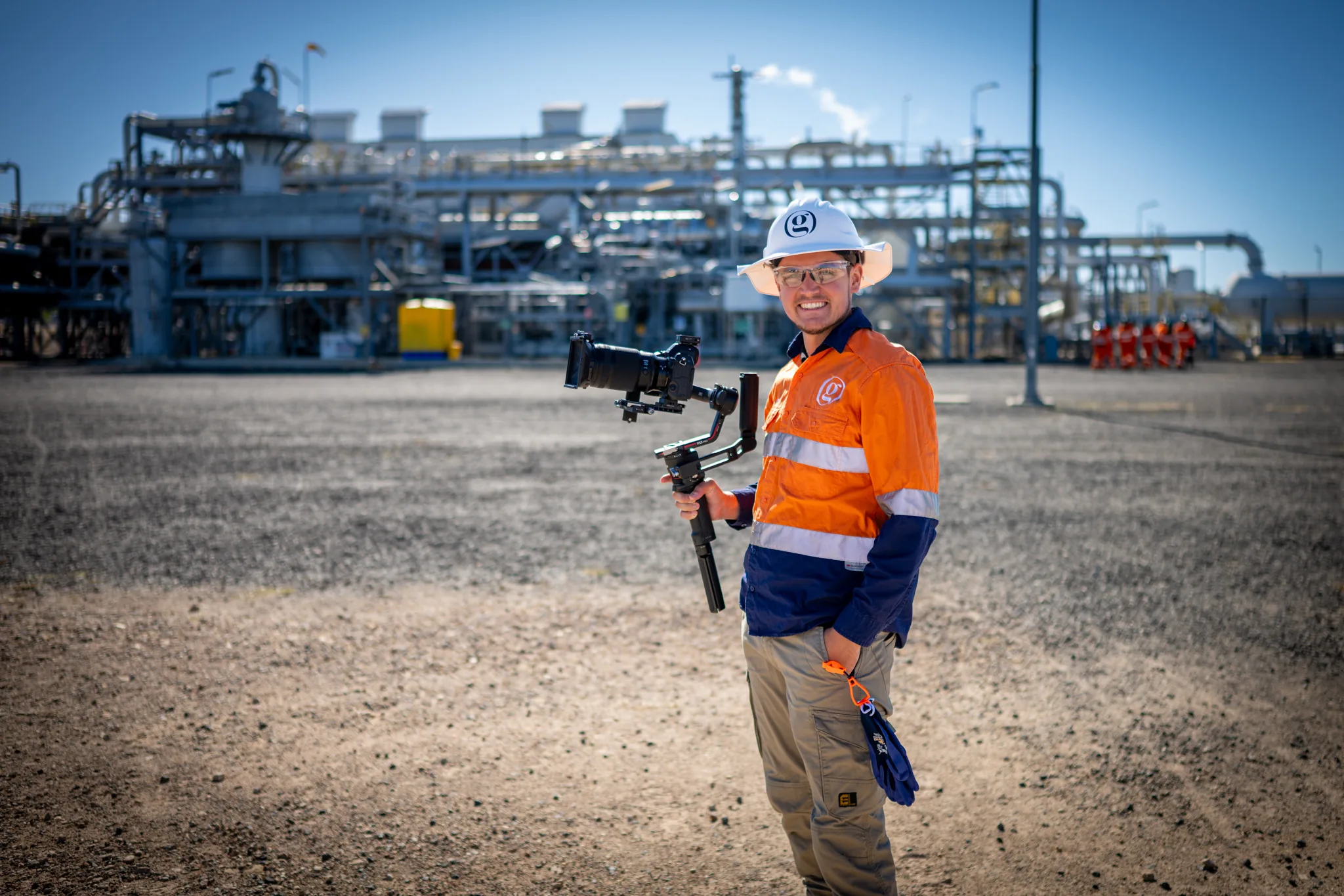 A Gerkies camera operator filming on an industrial site