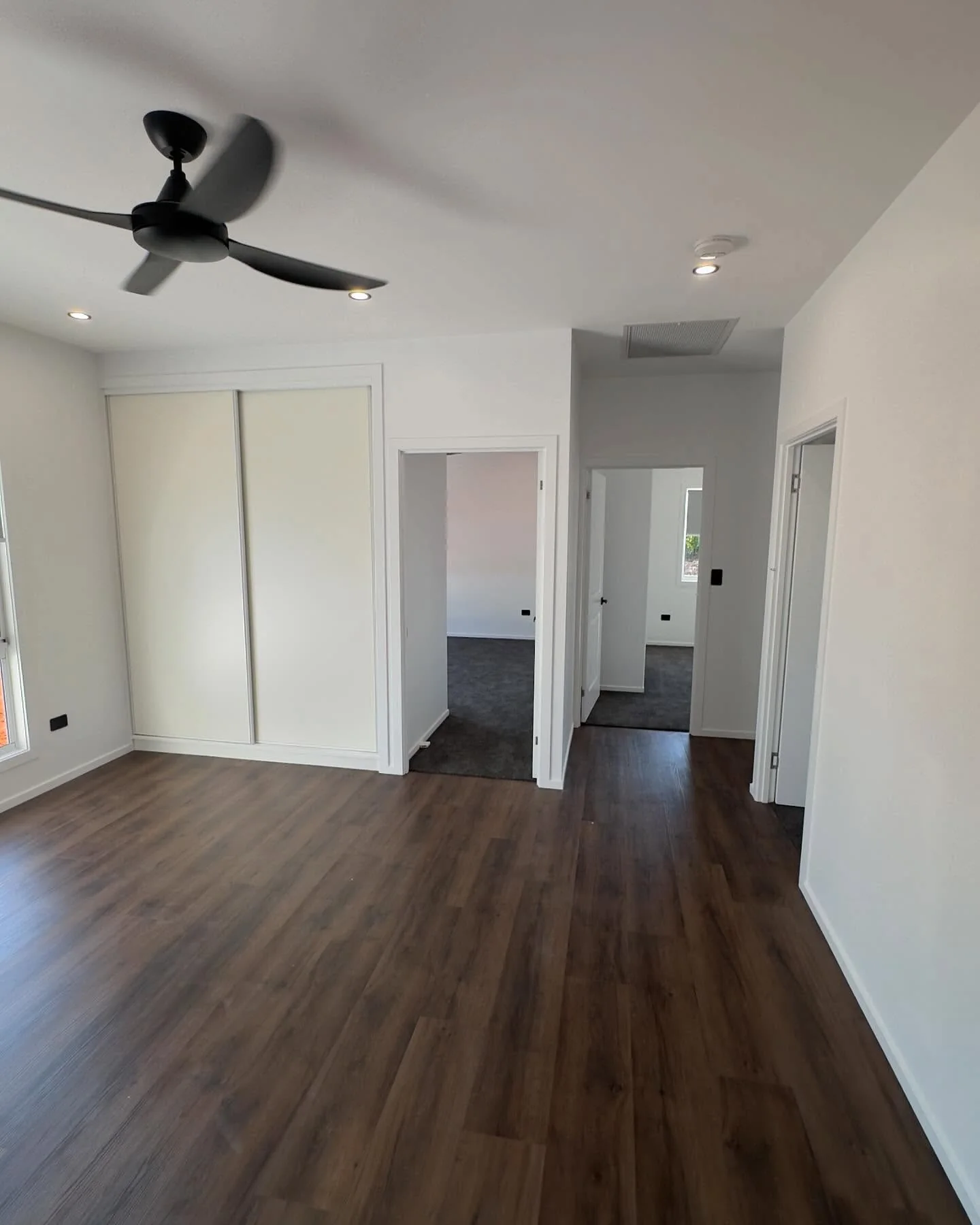 A finished residential living space and hallway