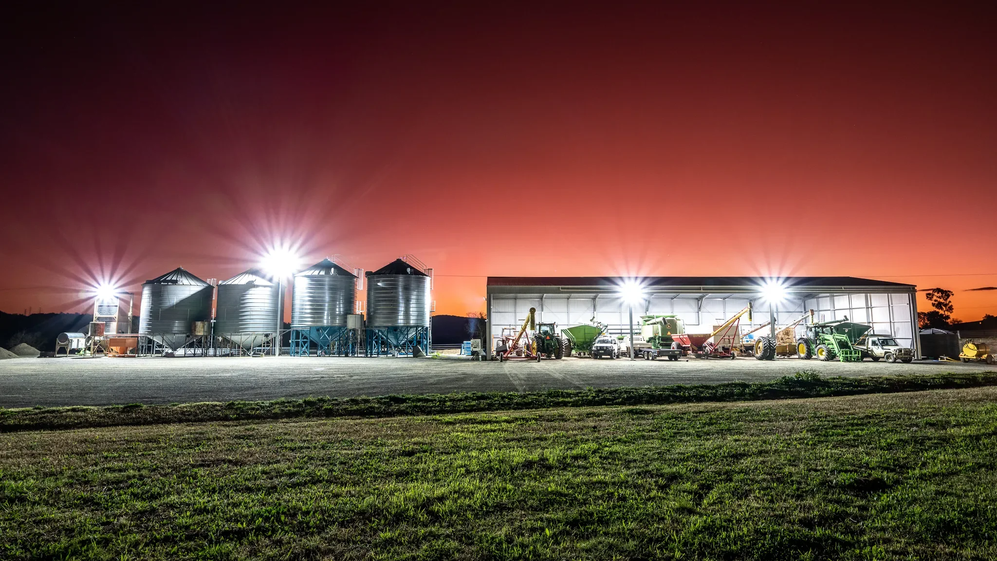 Commercial and agricultural work, lit up on site at night